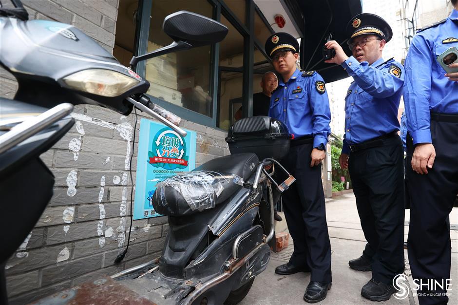 authorities on their bikes to ensure residential building safety