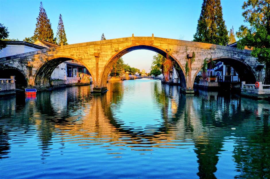 songjiang's tranquil ancient stone bridge captivates with silent beauty