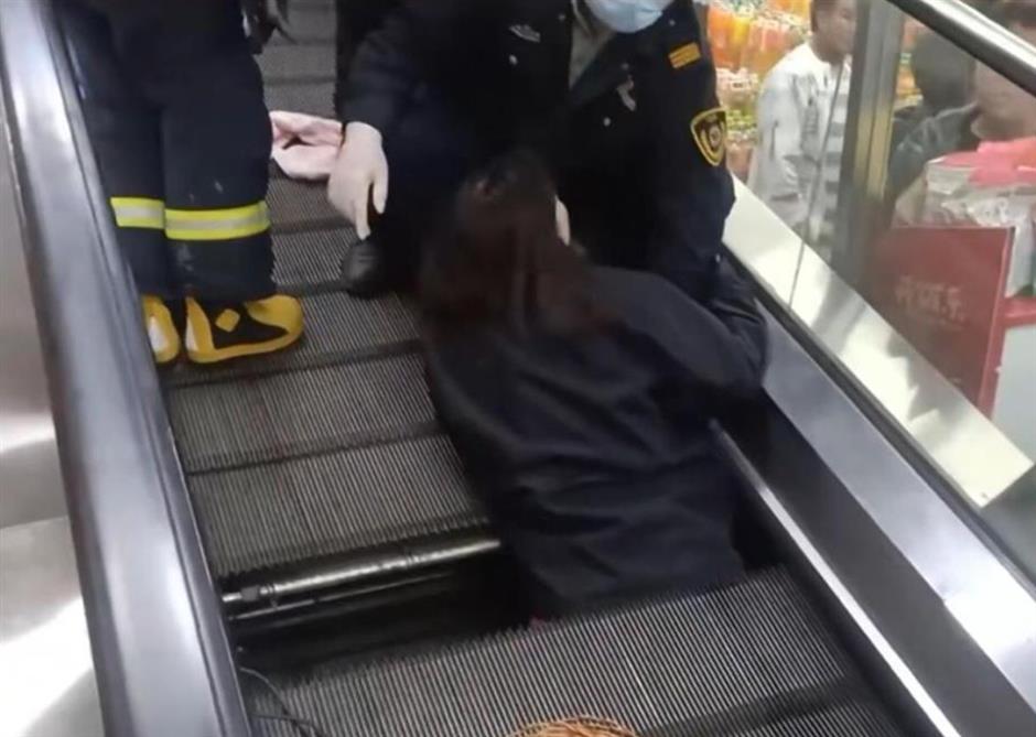 citywide checks after woman becomes trapped in moving escalator