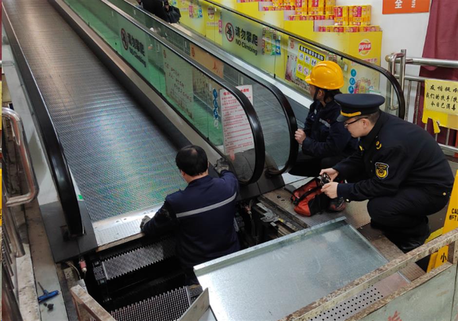 citywide checks after woman becomes trapped in moving escalator