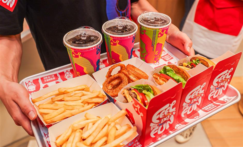 dairy queen opens first burger restaurant in shanghai