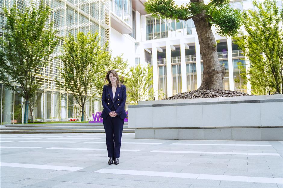 nyu president returns to shanghai in her new role