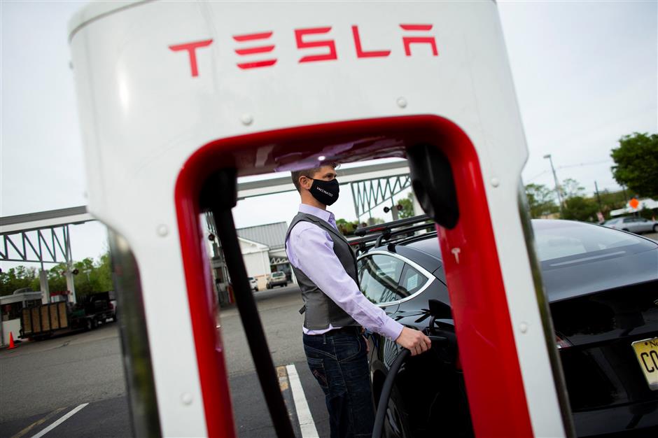 tesla cuts job openings since musk's economic warning