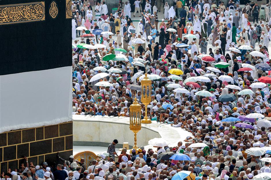 loved ones search for missing as hajj death toll passes 900