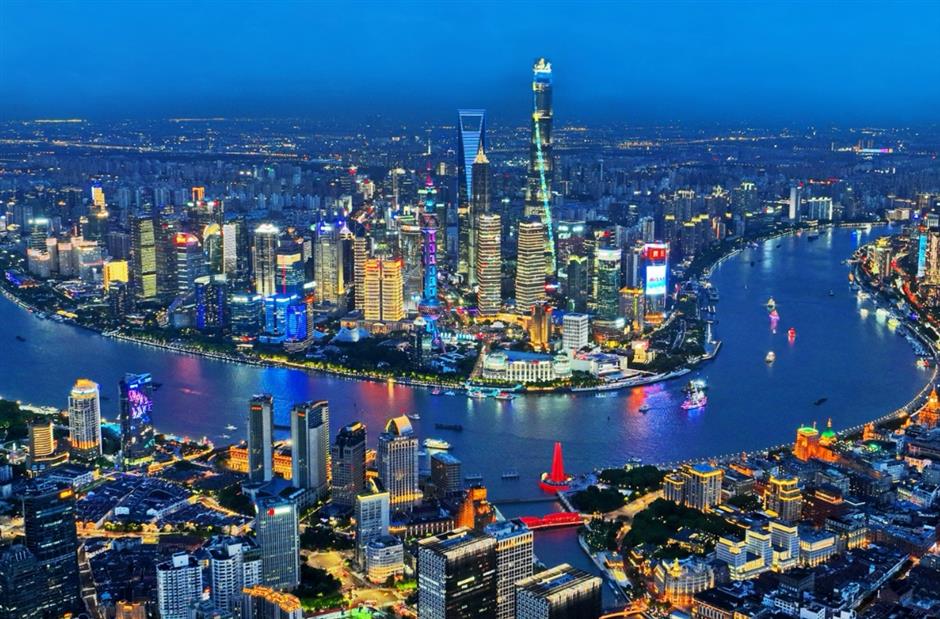 beautiful bund! shanghai dazzles as the night lights come on