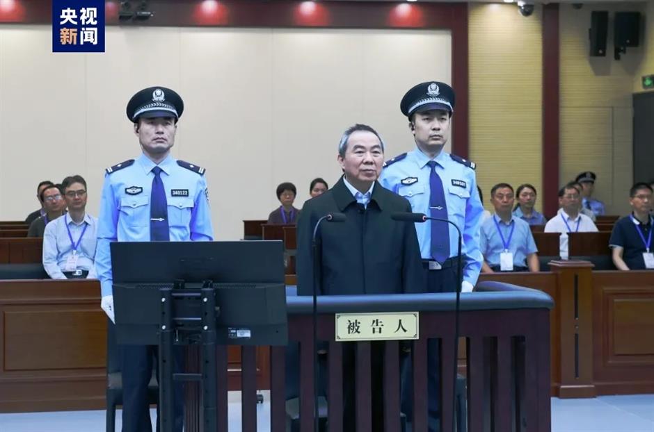 former senior legislator of shanghai stands trial for bribery