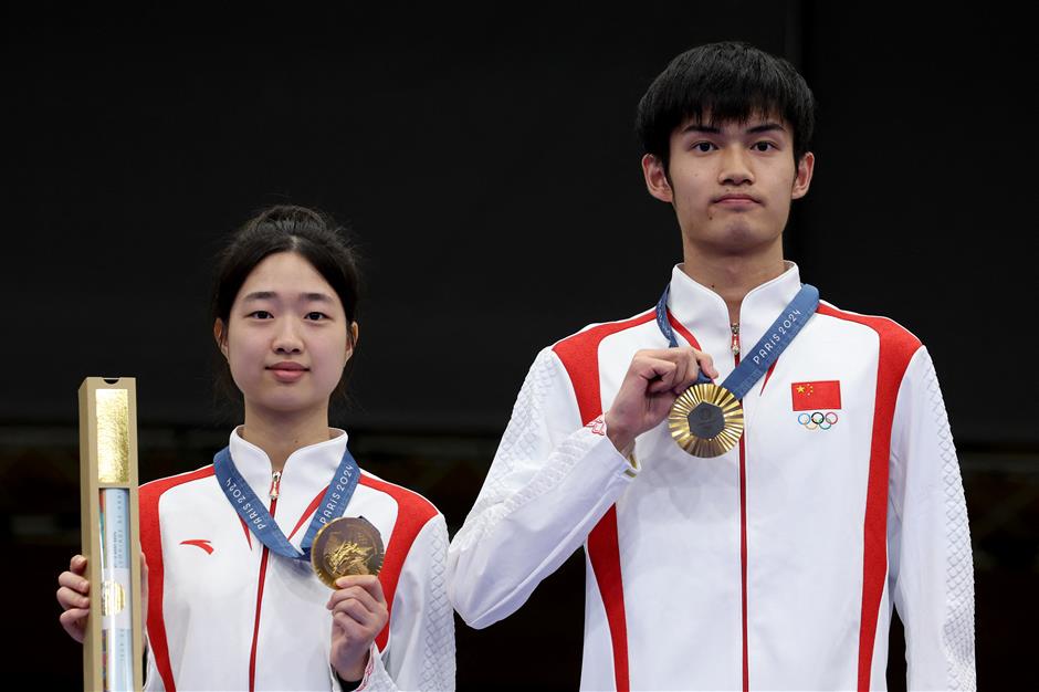 china's huang yuting and sheng lihao earn 1st paris olympics gold in 10m air rifle mixed team