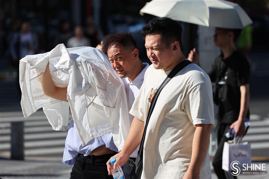 scorching shanghai! yellow alert issued for heat