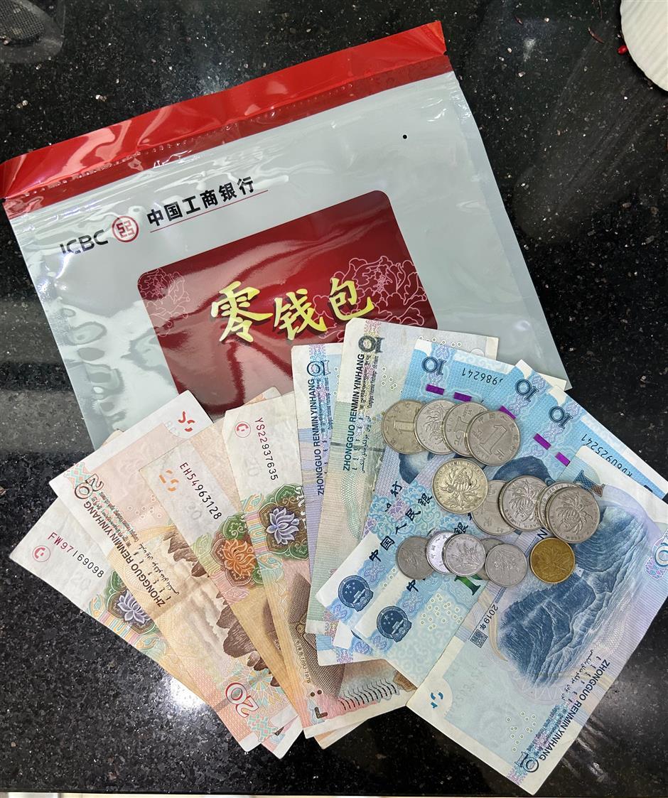 ep2: a traveler's guide to handling cash in shanghai