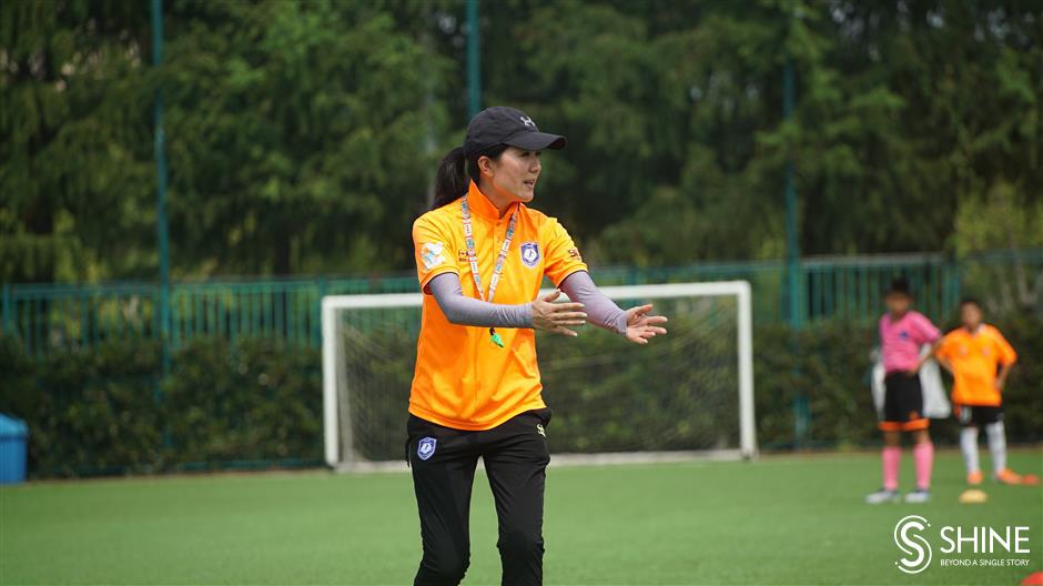 the former football pro passing her skills to shanghai's youth