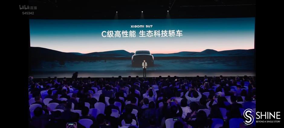 xiaomi unveils its first electric vehicle, aiming to be 'china's porsche and tesla'